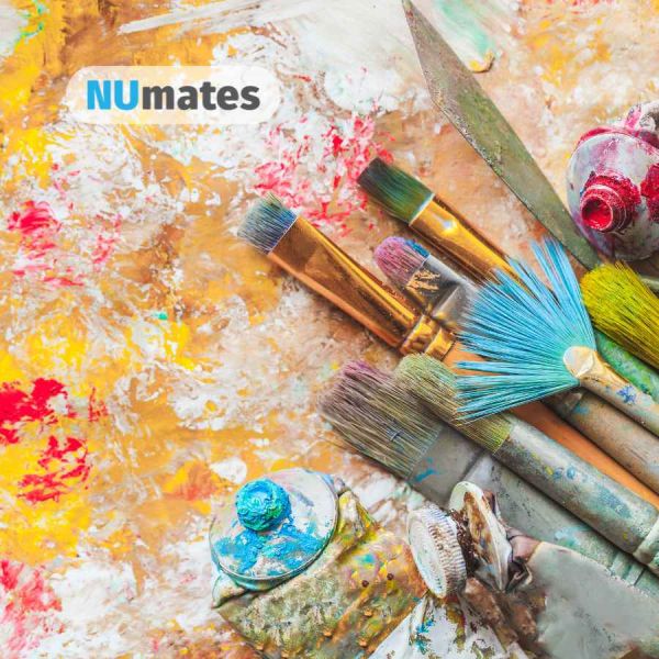 image of brightly painted background with a paintbrush