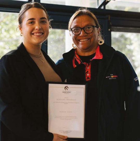 Makaah Darcy (left) and Yeena Thompson (right) celebrating at the 2024 Indigenous Scholars breakfast.