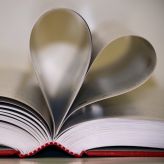 Pages of a book curved to make a heart