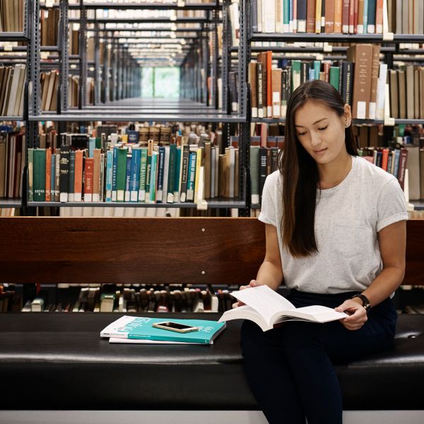 student in library. City supports accredited training for COVID-19 affected workers