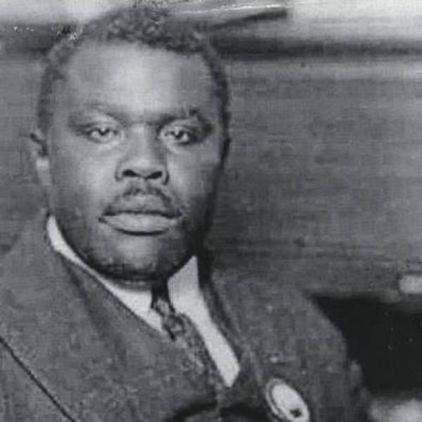 Black & white, head and shoulders shot of Marcus Garvey dressed in a suit