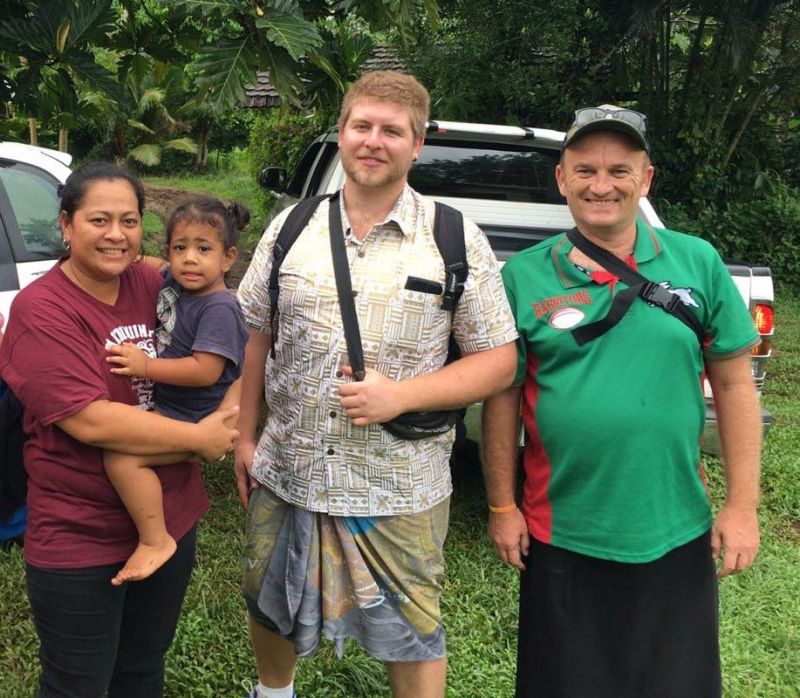 Stage 2 scholars Nathaniel Arnold, Bachelor of Education (Secondary) student, and Jason Connor, Bachelor of Environmental Science and Management, with their host in Samoa