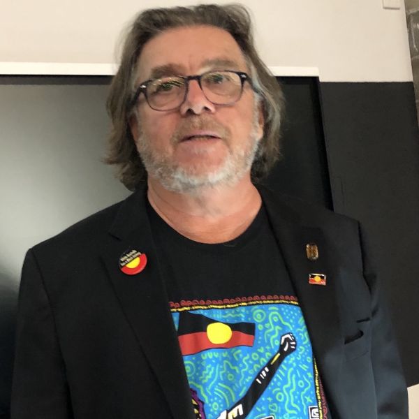 Professor John Maynard looking seriously at the camera. Always Was, Always Will Be Aboriginal Land: 2020 NAIDOC Lecture