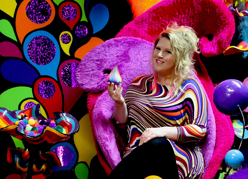 Photo of Bliss Cavanagh in one of her colourful sensory spaces