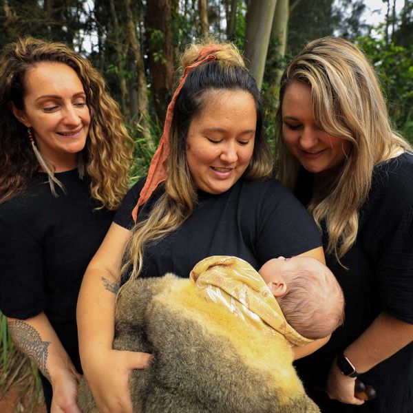 Dr Michelle Kennedy Dr Michelle Kennedy with a young aboriginal mother and baby