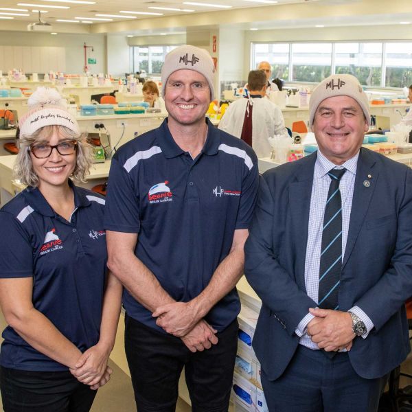 Kirralee and Mark Hughes with Vice Chancellor Professor Alex Zelinsky at the Mark Hughes Foundation Centre for Brain Cancer Research. Warm your Head and Heart!