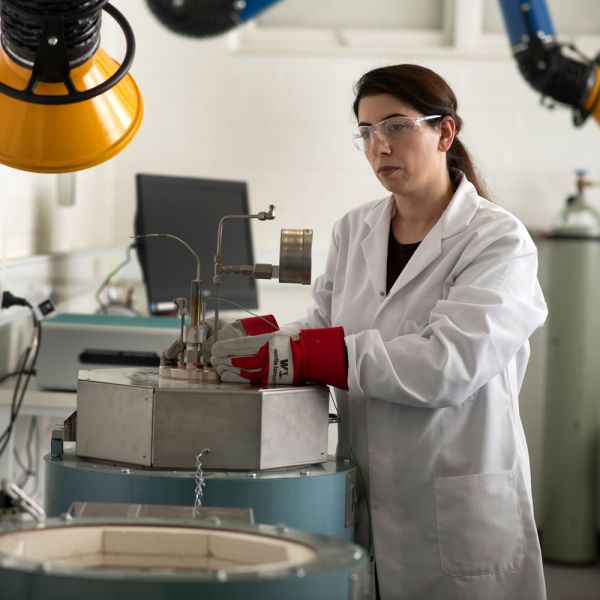 Simin Moradmand working in a lab coat
