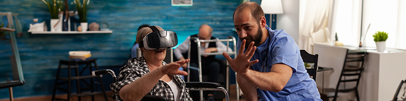 A man with a disabled women using VR