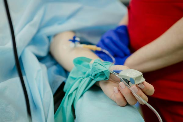 Delrium An image of a patients arm with an IV