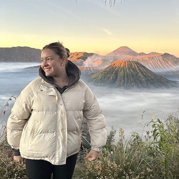 UON student with Volcanoes in the background