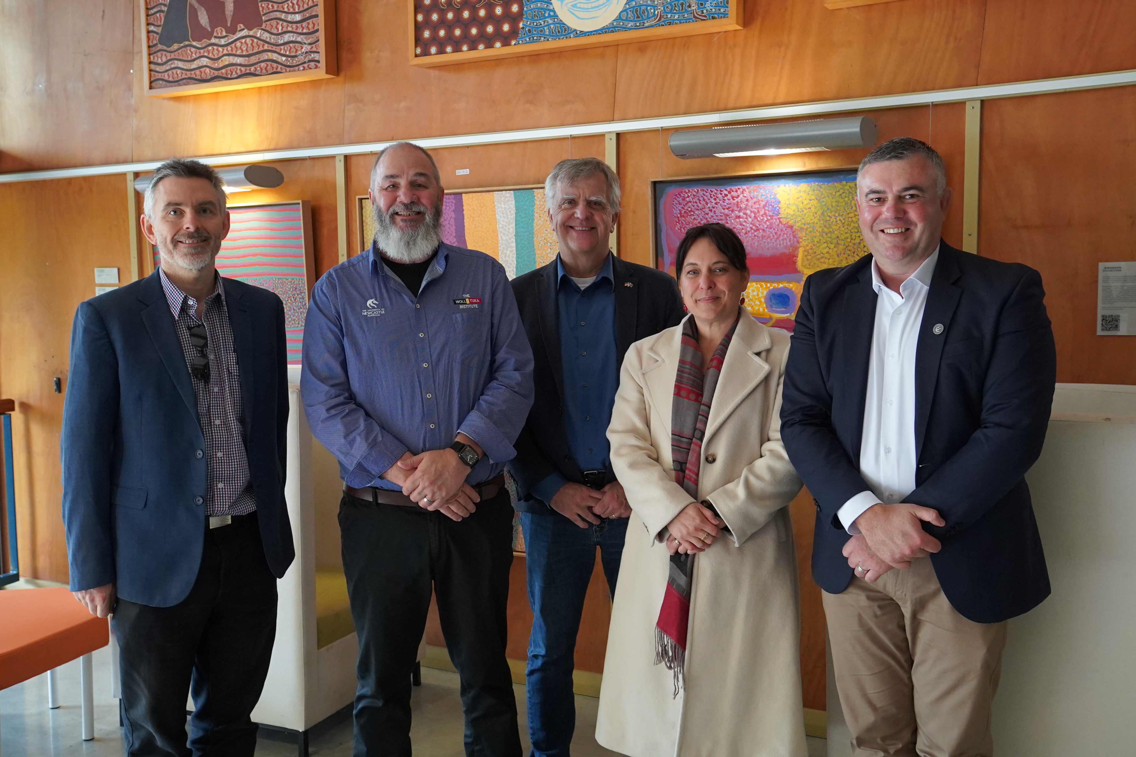 Representative from the University of Newcastle and CSIRO stand in a photo