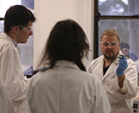 Students receive a demonstration of flexiproof printing at the winter school. Winter School inspires the next generation of scientific researchers