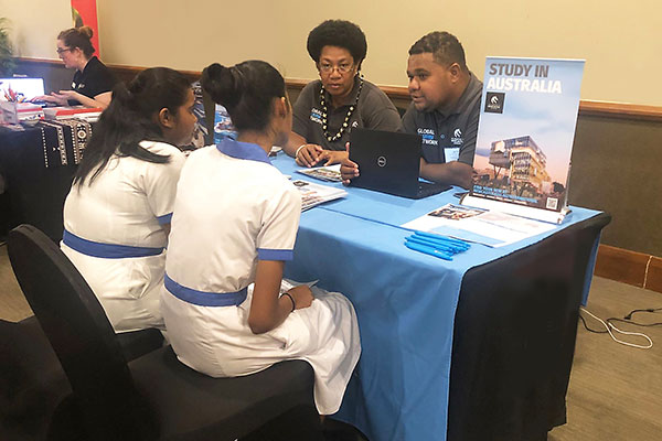 Image of Global Alumni ambassadors at education fairs