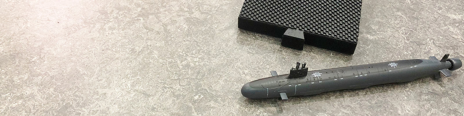 Smart anechoic materials for acoustic signature control