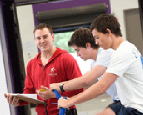 Two students exercising in sport centre. Sport Partnership