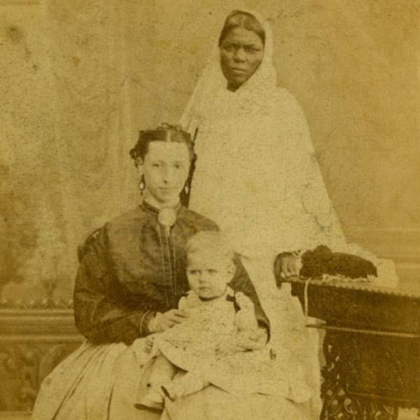 Lady with ayah. Research uncovers the historical experiences of the earliest global domestic workers