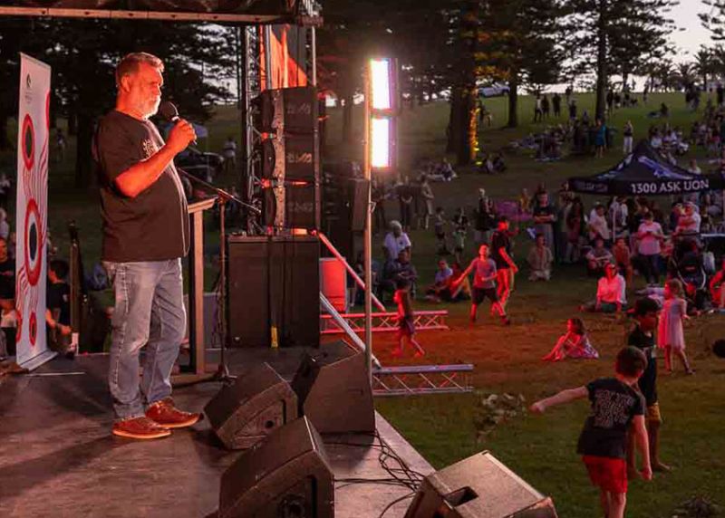 The children play at the front of the stage during family-friendly event, Ngarrama.