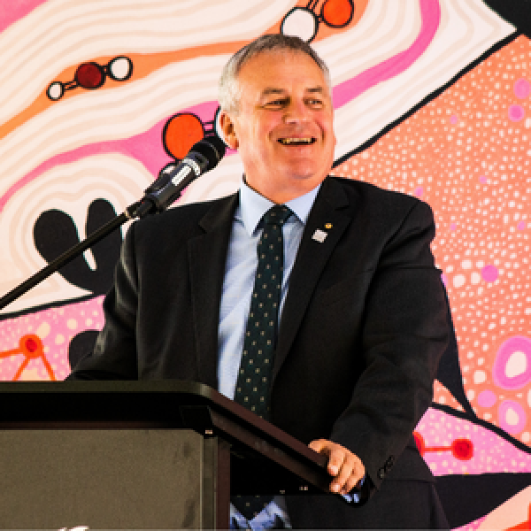 The Vice Chancellor smiling at a presentation