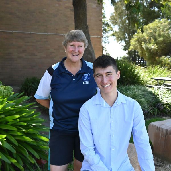 ARC Centre of Excellence – Minerals researcher, University of Newcastle PhD Chemical Engineering Student Josh Starrett with his Merewether High science teacher Ros Penson