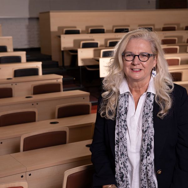Susan Ledger-WEB-8678 Susan Ledger sitting in a lecture theatre