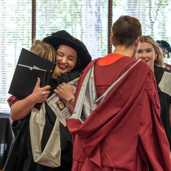 Tori graduated on Monday 16 December, photographed hugging fellow graduate. Tori digs up past to plan for her future.