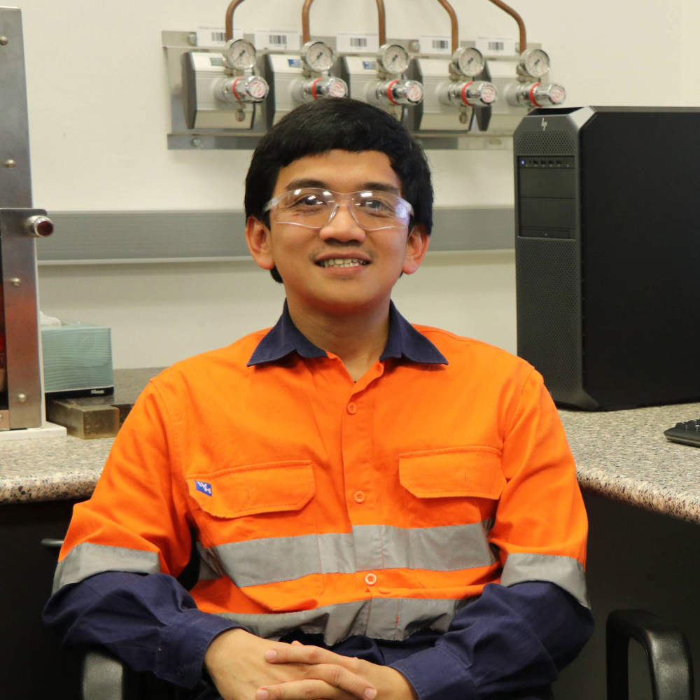A man sitting at a desk.