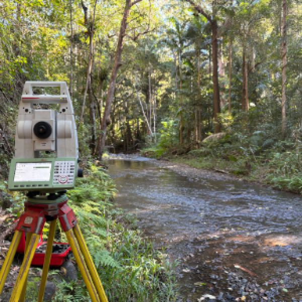 Image of surveying equipment in bushland setting