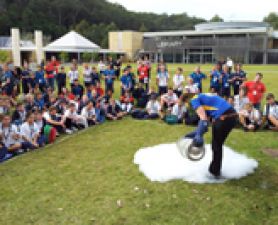 Group school students watching demonstration. Kids on campus