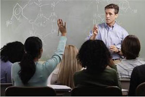 Teacher addresses a classroom of students