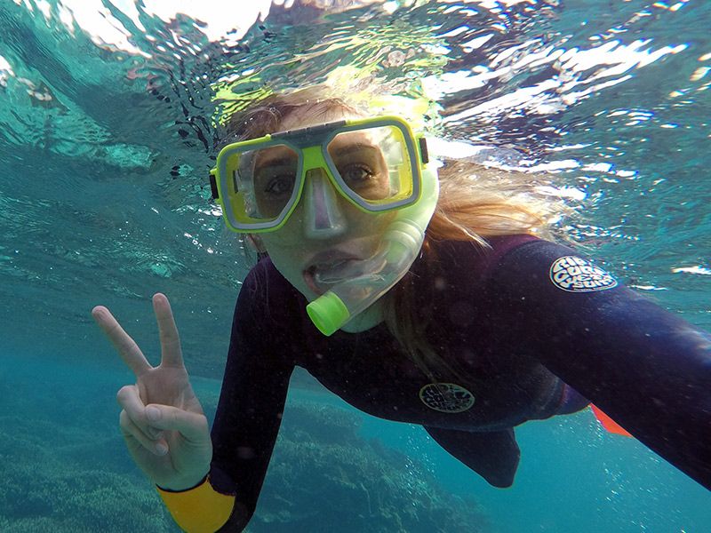 Woman taking a selfie while snorkelling