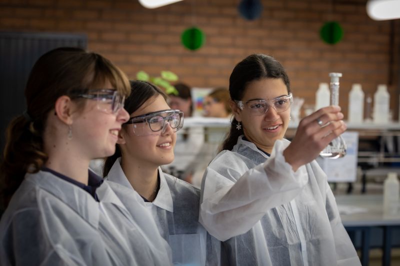 Students in the HunterWiSE program engaging in chemistry based activities while on a campus visit to the University of Newcastle