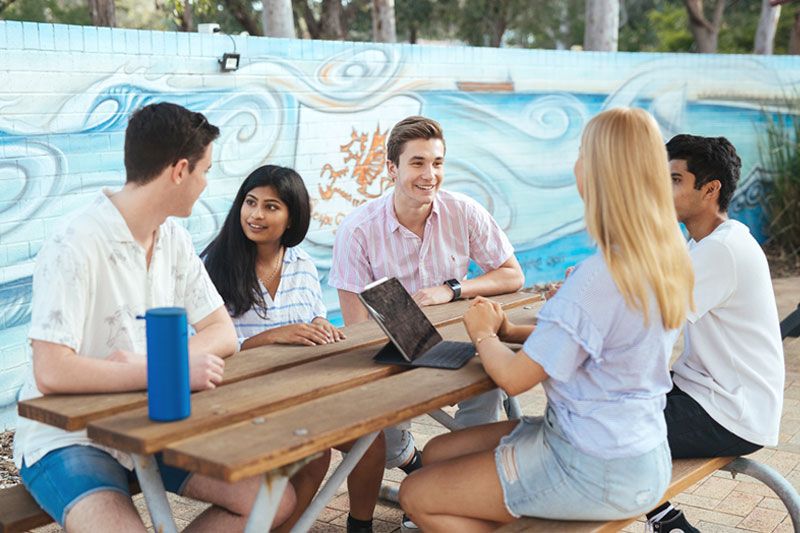 Residents relaxing by the International House pool