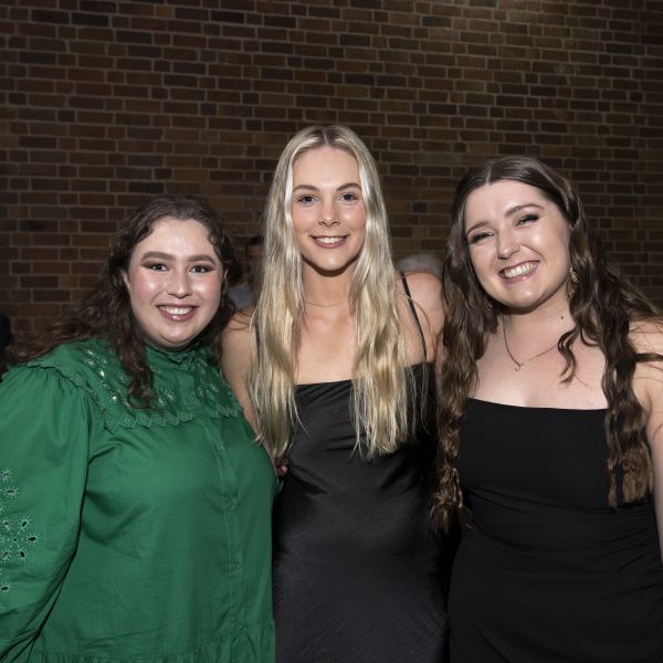 Three attendees at the Sports Awards