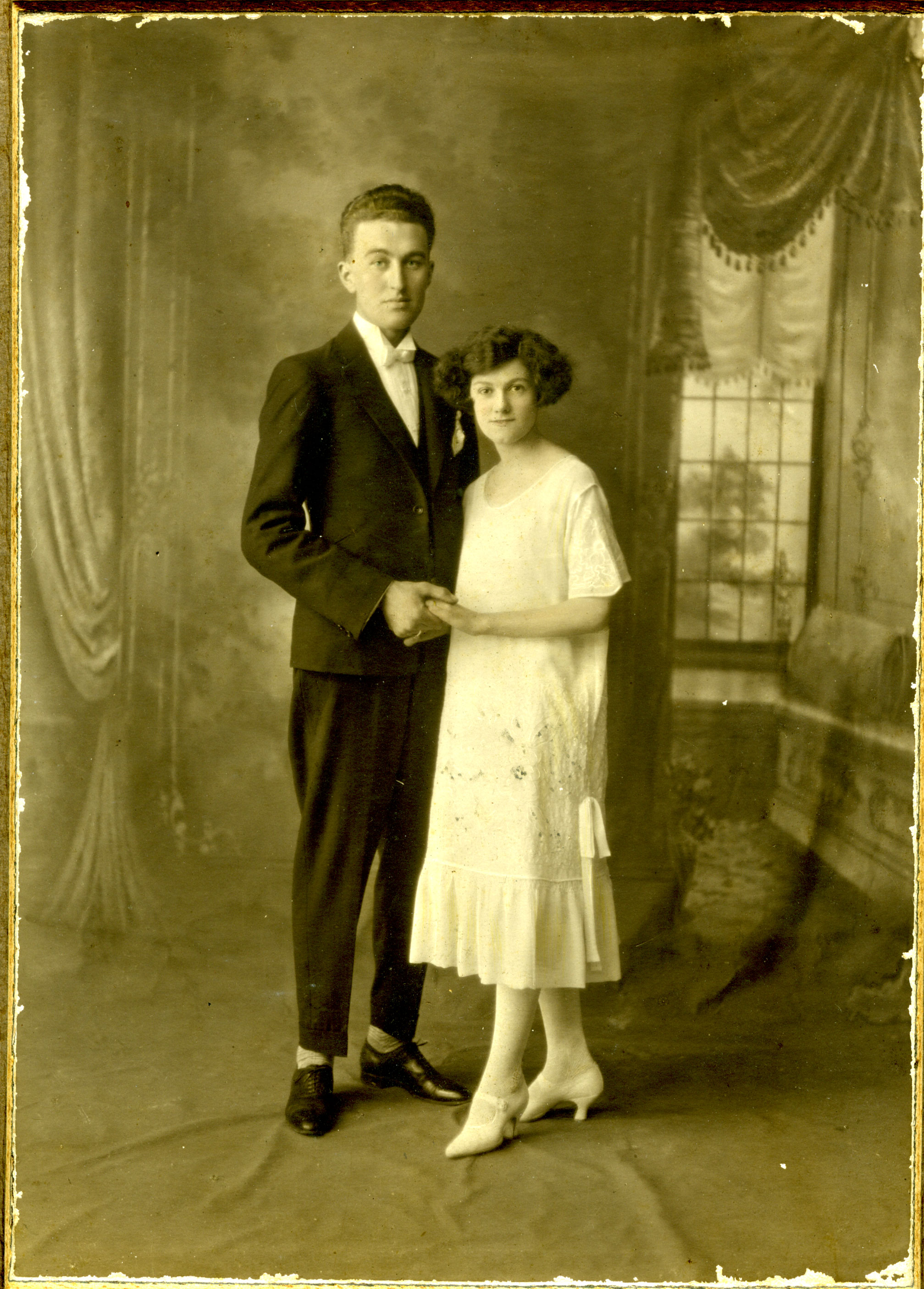 Man and lady posing for photo
