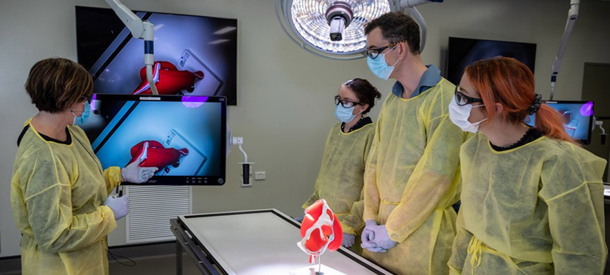 Students learning from teacher in a lab