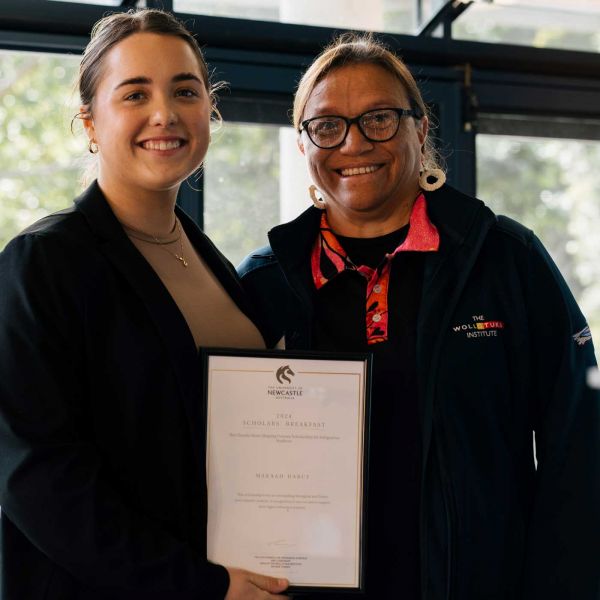 Makaah and Yeena smiling at camera