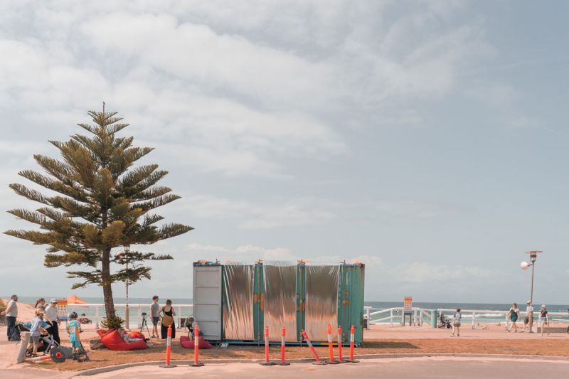 Shipping container sitting near waterfront