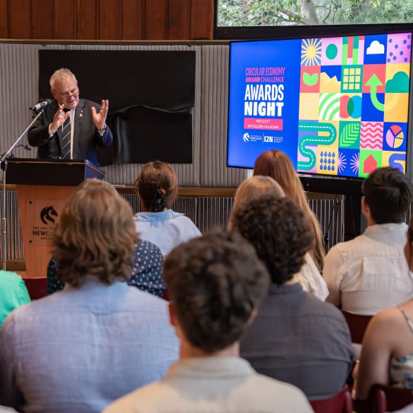 Professor Alex Zelinsky AO pictured at a Lectern presenting to a crowd of people seated. Grand Challenge winners share in $30,000 to bring circular economy ideas to life 