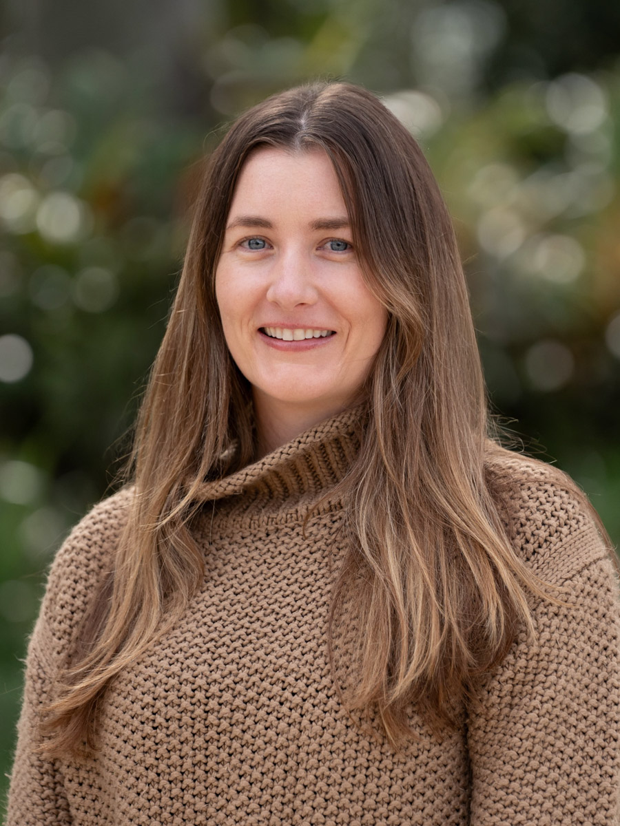 Dr Brooke Williams headshot of Dr Williams smiling to camera