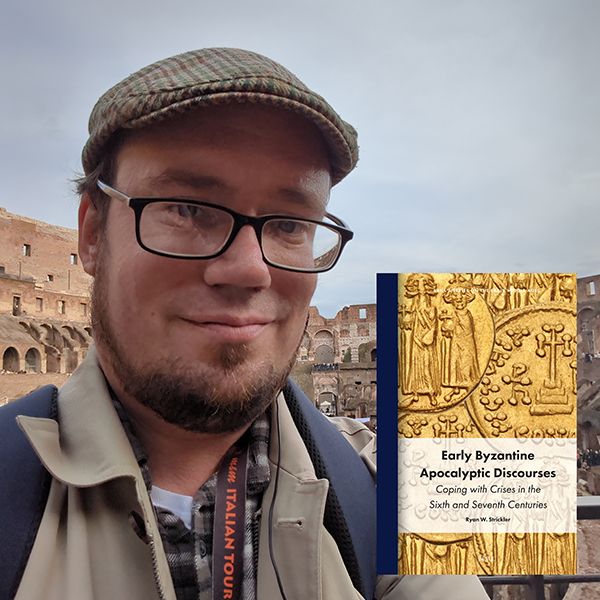 Dr Ryan Strickler with his new book cover