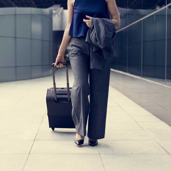 Business woman travelling. New travel management service provider