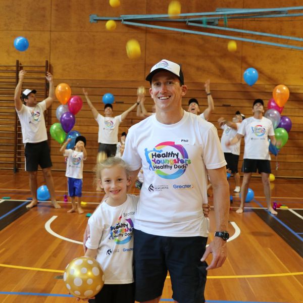 Professor Phil Morgan with his daughter and program participants. World-first family health program launches