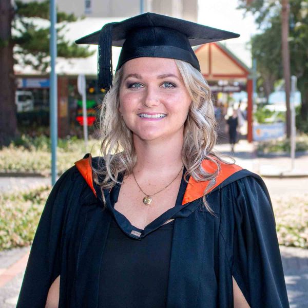 Kyra Fuller at graduation. Midwifery graduate pays the gift of life forward.