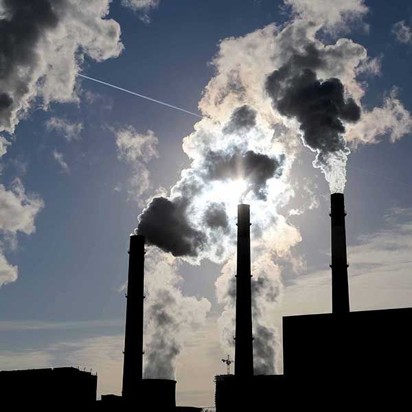 Smoke stacks. Dr Askland part of research project to study advocacy coalitions