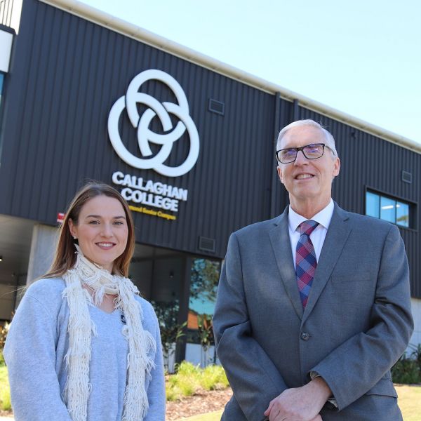 John Fischetti with student in front of Callaghan College. Silver lining for COVID-19 affected HSC students 