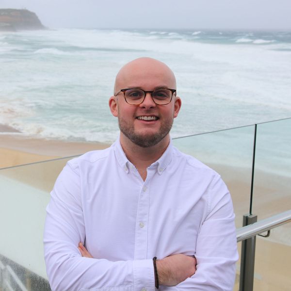 Dr Andrew Magee at the beach in Newcastle