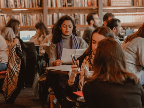 People studying in a library