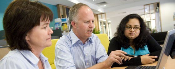 Finance staff discussing work