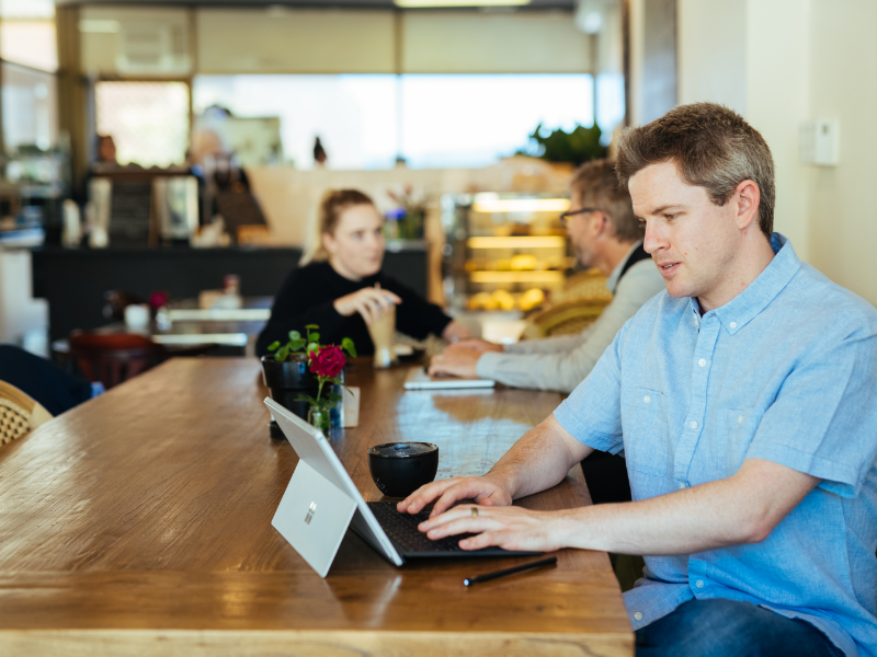 Staff member on computer An image of a staff member working on his computer