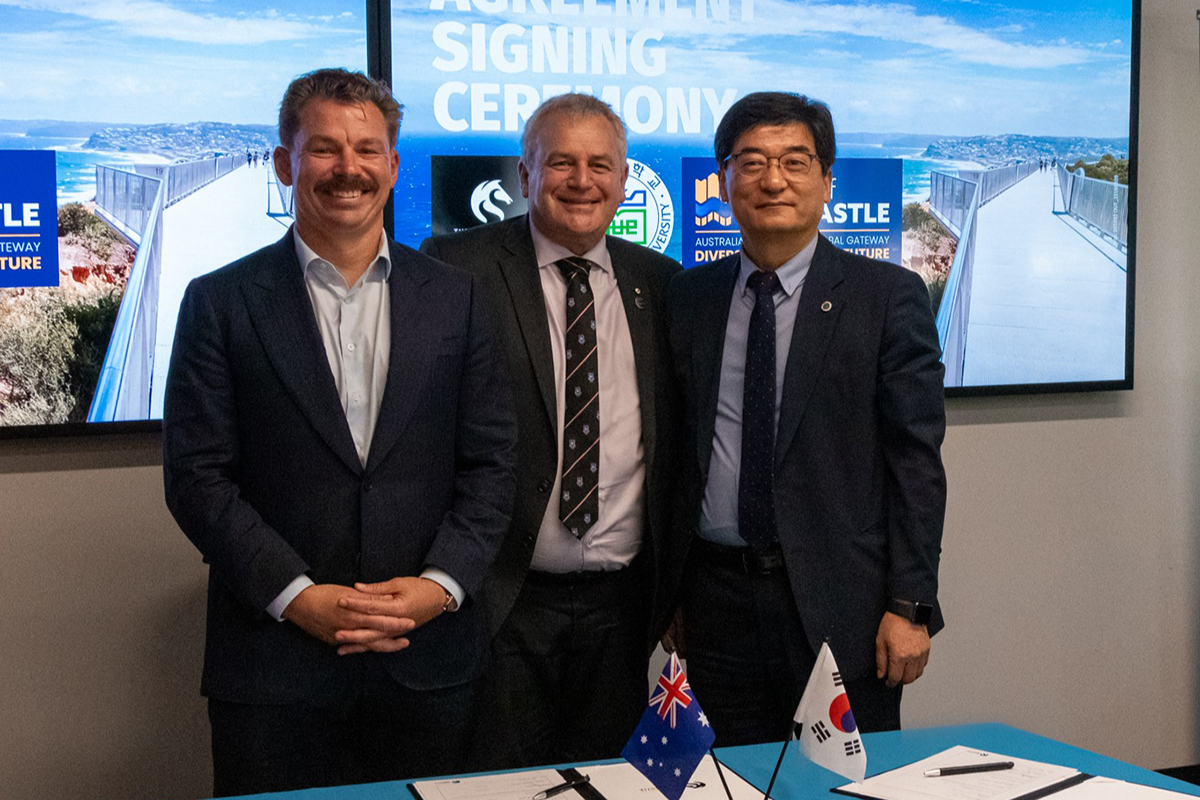 Group photo of the Memorandum of Understanding signing